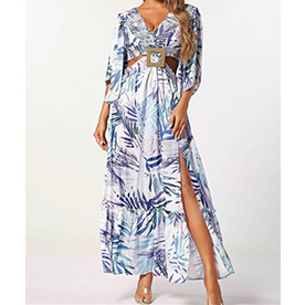 Printed maxi dress with vneck, long sleeves and hoop decor in the front, cutout and low back, and maxi skirt with slit detail.