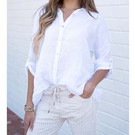 Button down linen true white top, featuring roll up sleeves.