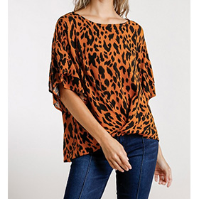 This trendy top adds the perfect color to one of the favorites animal print styles. Get it now.