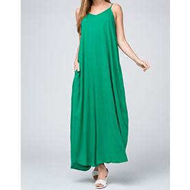 Solid scoop-neck maxi dress featuring pocket detail at side and adjustable straps.