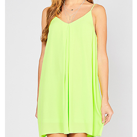 Solid wide v-neck dress featuring inverted pleat detail at front. It has adjustable straps, lined and semi-sheer.