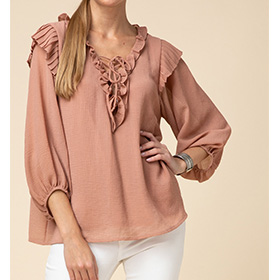 This peasant style top is very cute and classy. Pair with white jeans and boots and you will rock your outfit.