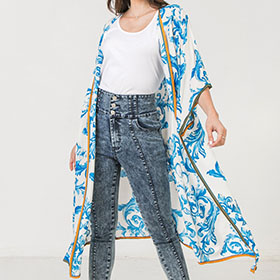 This coverup kimono is very versatile to dress up or down. Wear with jeans or to the beach or pool with a white swimsuit.