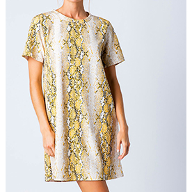 Knit tunic shirt dress featuring a marvelous snake print with bright yellow details.