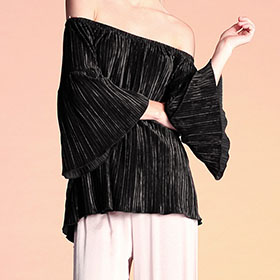 Classy pleated velvet off shoulder black top. Perfeclty elegant for the holidays, still sexy with the off shoulder neckline.