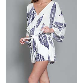 Beautiful romper featuring navy blue leaves print on a solid white. 